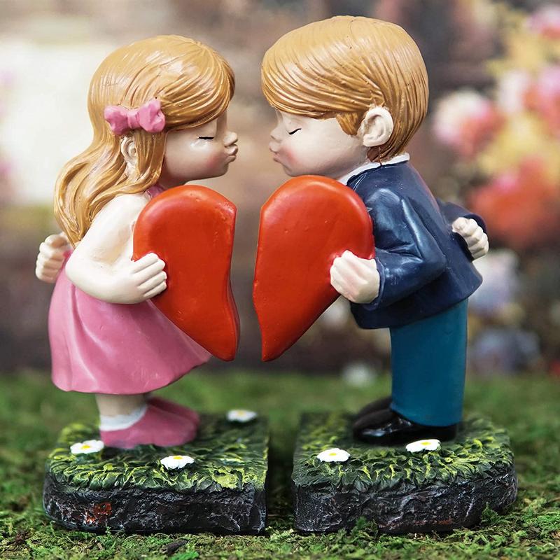 Ebros Love at First Sight Boy & Girl Kissing and Holding Split Red Heart Statue