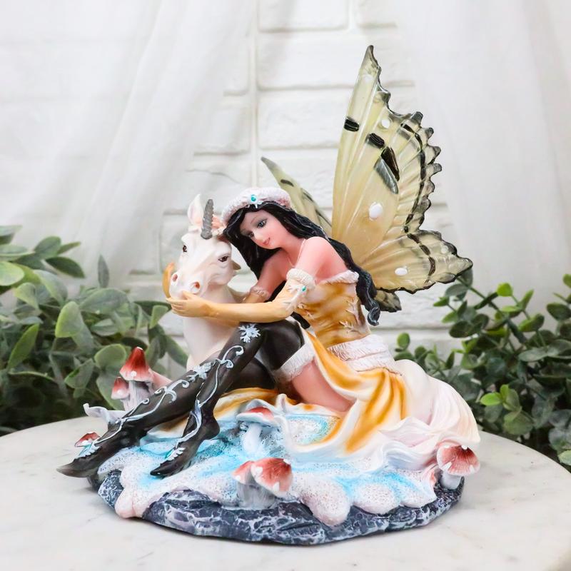 Ebros Winter Butterfly Fairy with White Unicorn On Mushrooms Figurine 6.5" Long