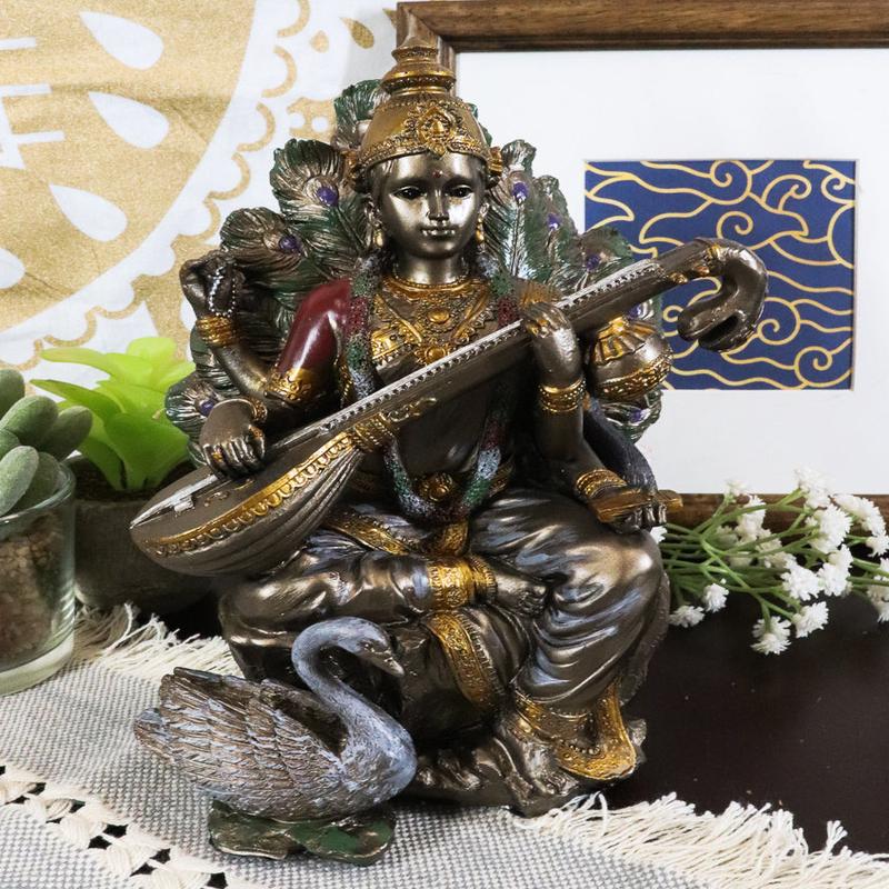 Ebros Hindu Goddess Saraswati Playing Veena With Swan On Peacock Throne Figurine