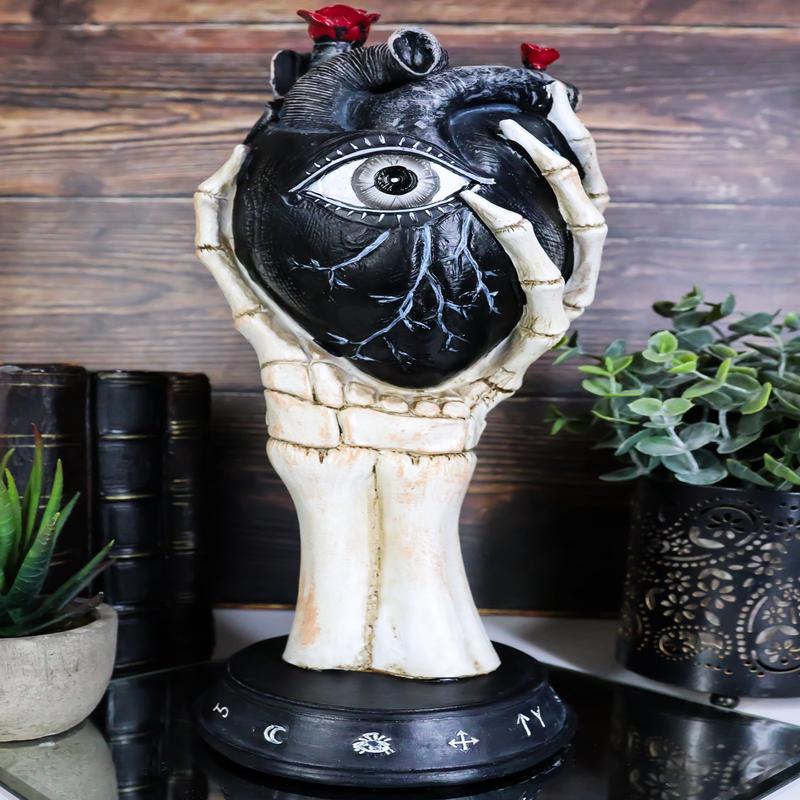 Gothic Alchemy Skeleton Hand Holding Black Anatomy Heart With Evil Eye Figurine