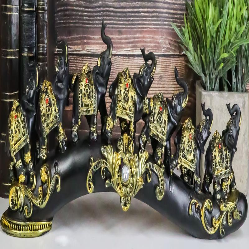 Elephant Herd On Great Migration On Black Tusk With Golden Scrollwork Figurine