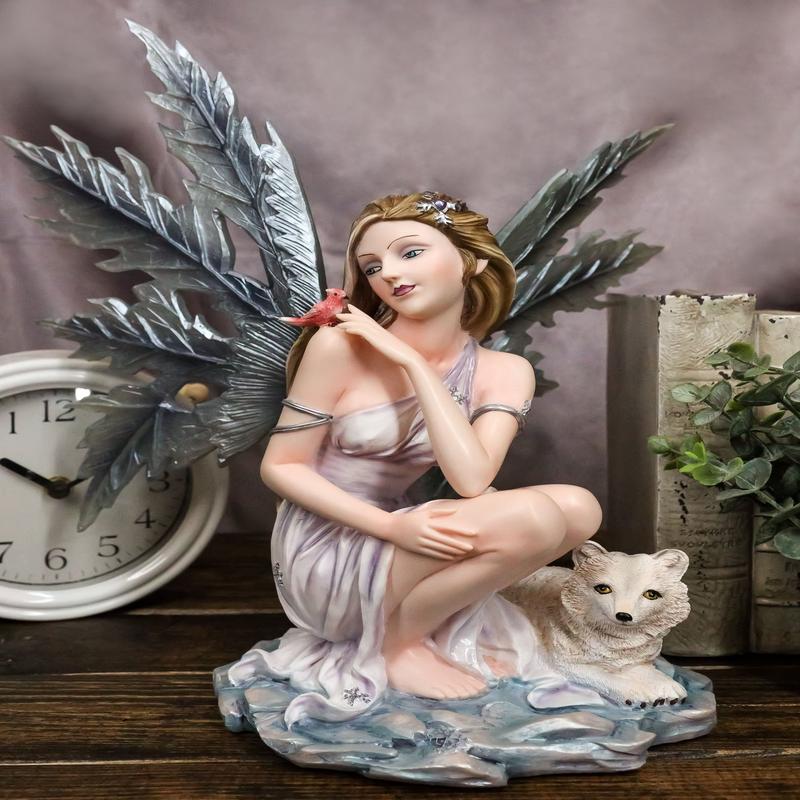 Blue Frozen Ice Fairy with Frost Flake Wings Crouching by Snow Wolf Pup Figurine
