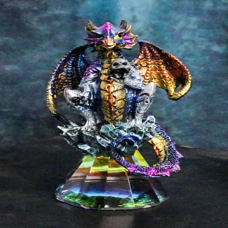 Iridescent Armored Rainbow Wyrmling Dragon Skull On Faux Crystal Prism Figurine