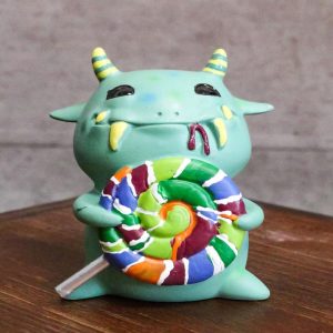 Ebros Gift Green Mogu Monster With Lollipop Sweet Tooth Hypnotic Alien Figurine