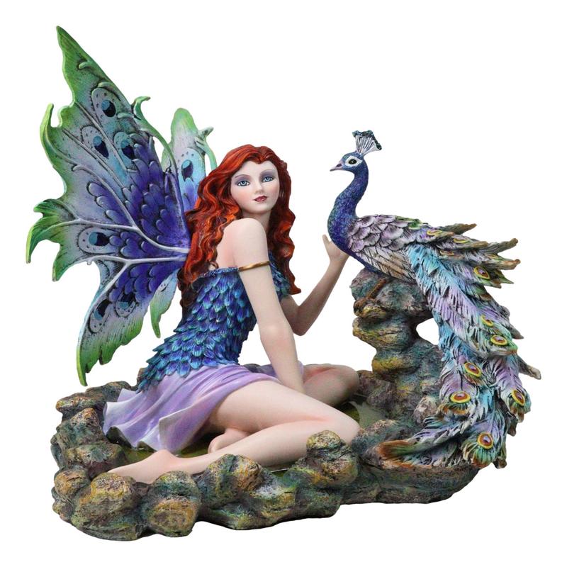 Large Fantasy Fairy With Blue Iridescent Train Wings Sitting By Peacock Statue